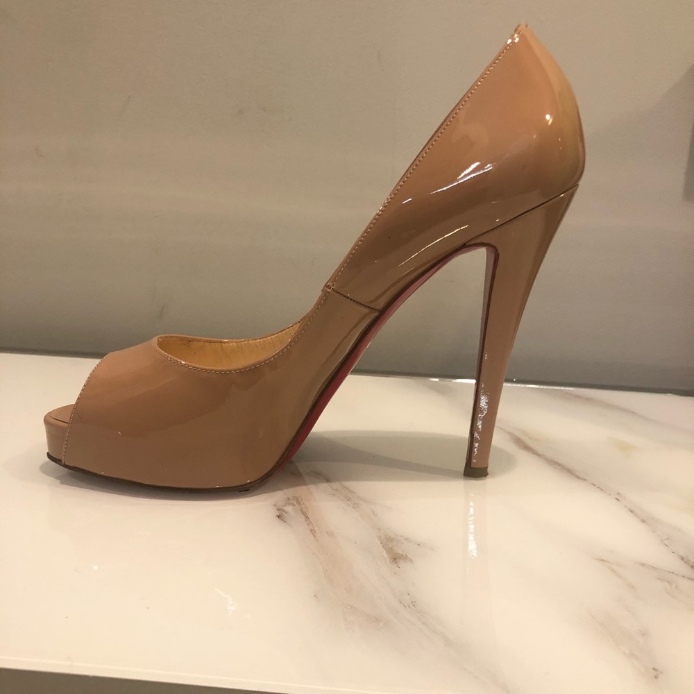Christian Louboutins nude patent leather peep toe pumps side 38.5